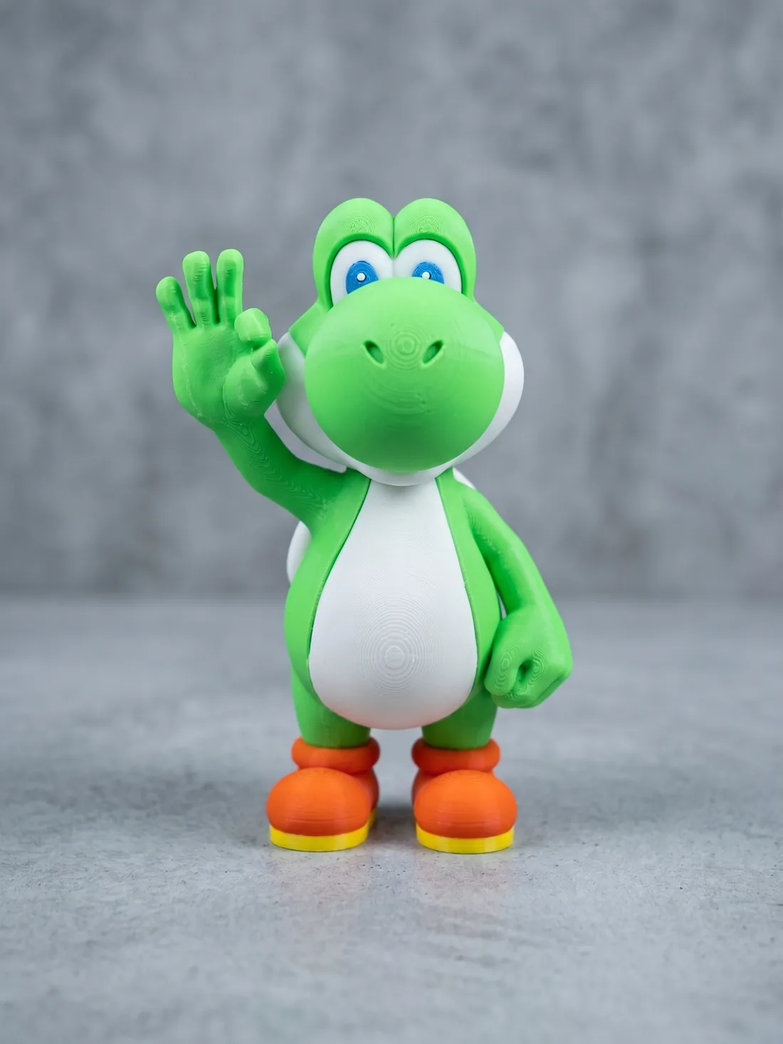 Custom 3D-printed Yoshi character figure, hand-painted finish