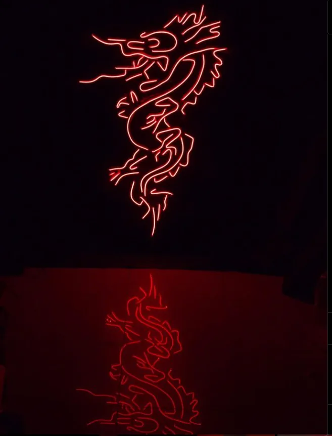 Red dragon neon sign glowing in a dark room