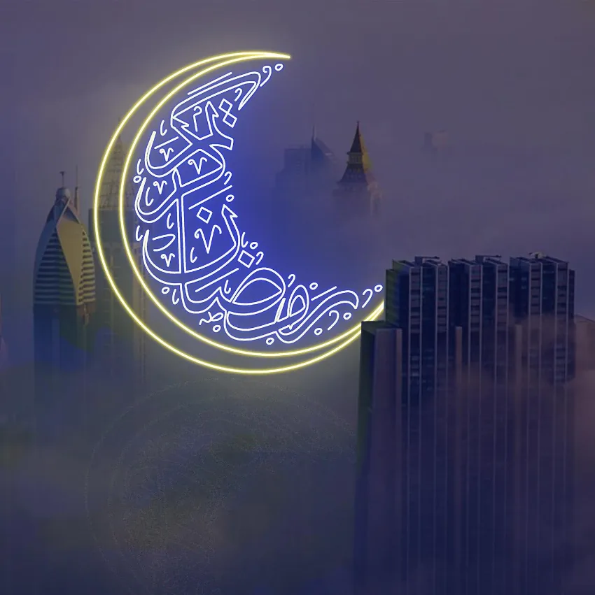 Gold crescent with Arabic calligraphy in neon