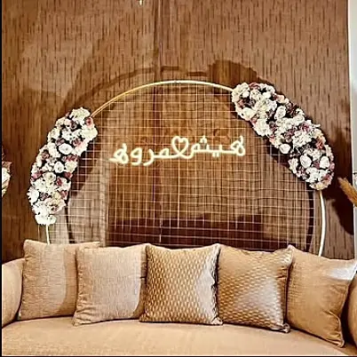 Wedding neon sign backdrop at an event — custom event neon, delivered across Dubai and the UAE